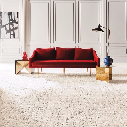 red nylon couch on white carpet - Flooring Store in Oakville