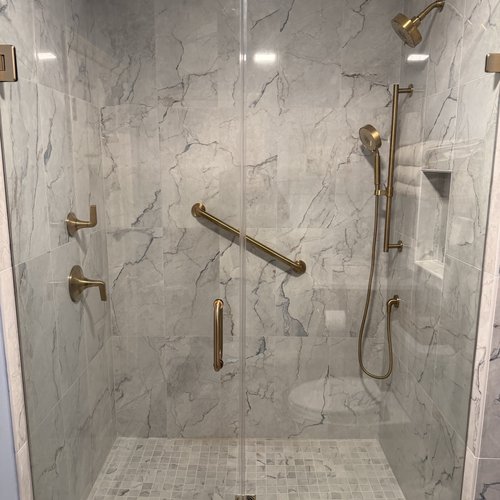 new shower tile install with sterling fixtures